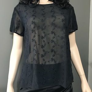 See through floral print black blouse